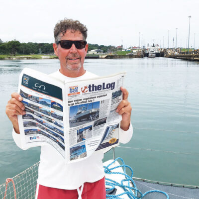 TAKING A READING BREAK AT GATUN LOCKS IN PANAMA CANAL